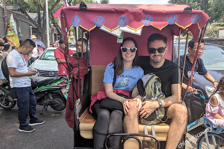 Our Guests Taking a Rickshaw in Beijing Hutongs