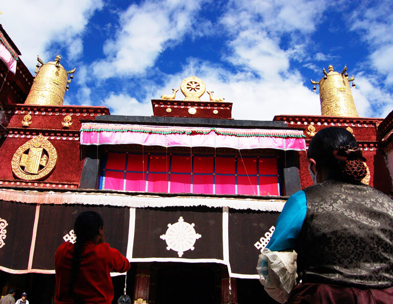 Tibetan Pilgrim outside the Potala Palace