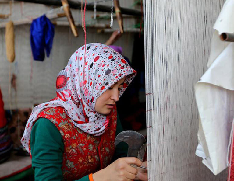 Hotan carpet making in a local family workshop